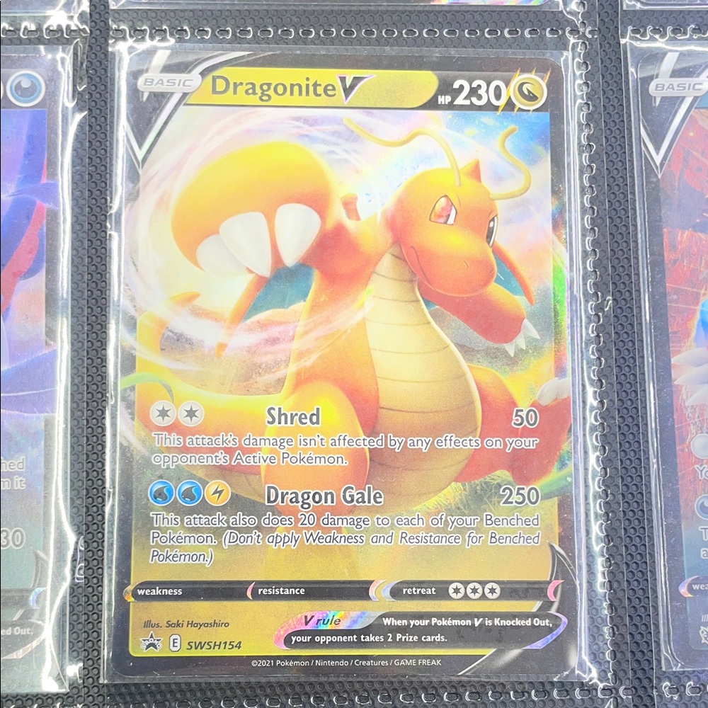Pokemon Dragonite V Trading Card - Yellow and Orange